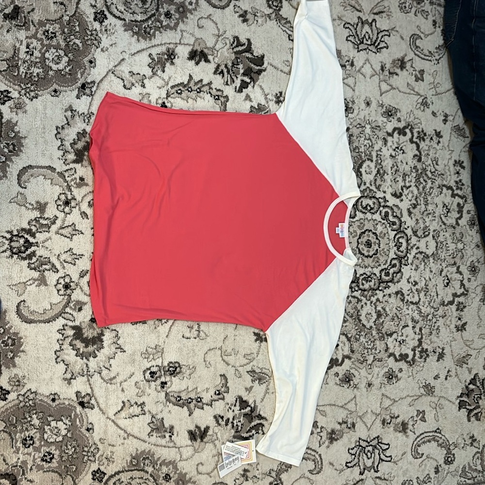 Selling brand new Lula Roe women shirt.